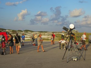 The growing crowd observes the Sun waiting for the sky to darken.