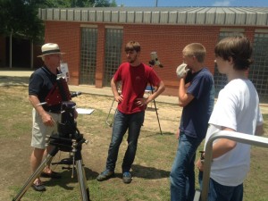 Ken discusses the spectroscope while Tom is in class.