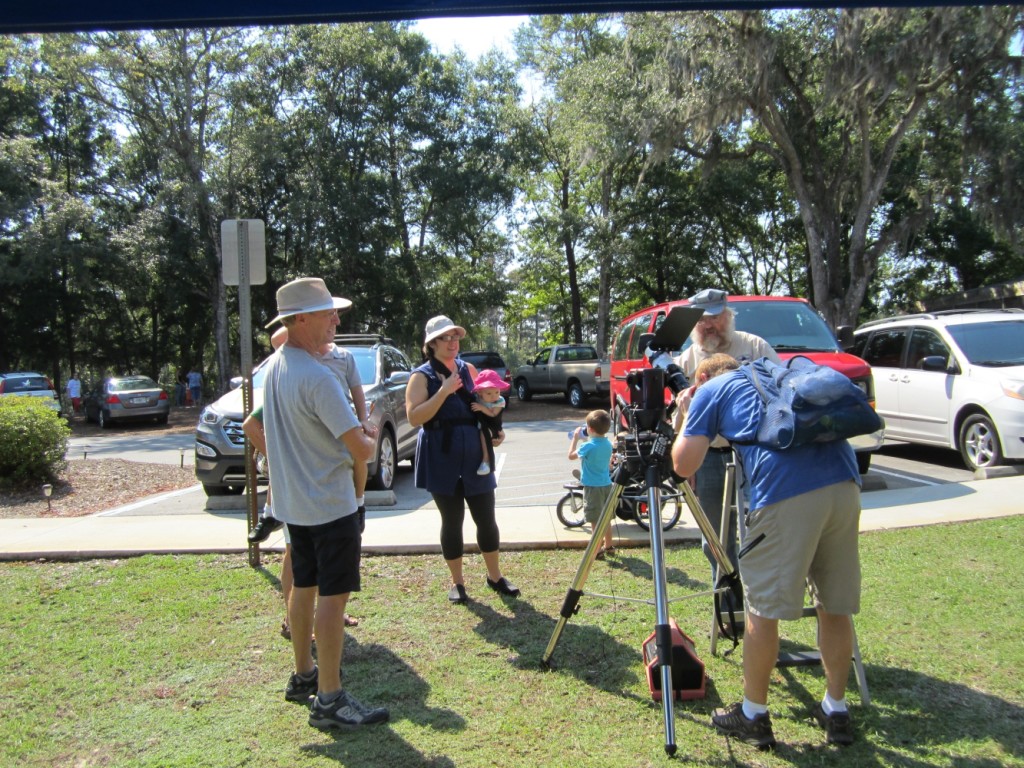 Guest observers view the Sun in Hydrogen-Alpha light.