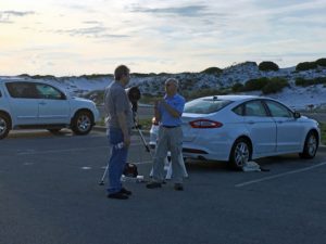 Dean and Scott discuss the coming evening's activities.